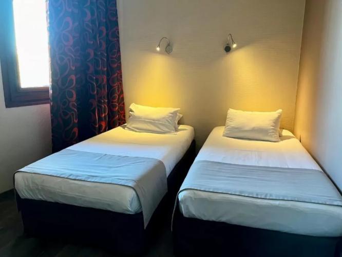 Cit'hotel Le Louvre Hotel